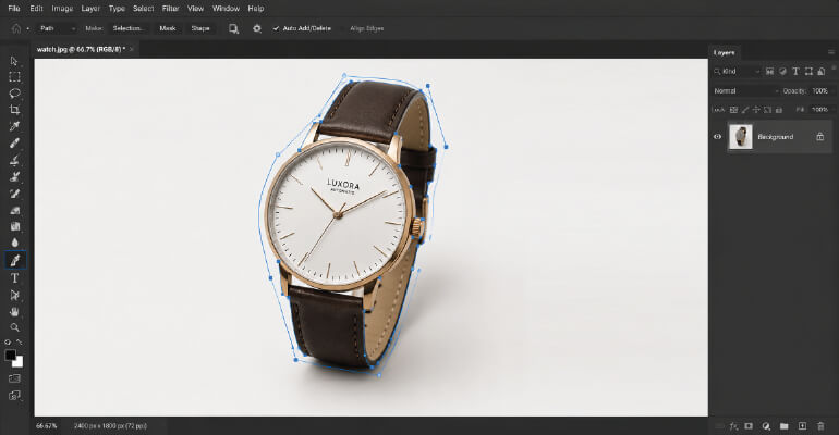 Photoshop canvas showing a pen tool path being drawn around a wristwatch