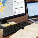 Title Examiner Reviewing County Deed Books Banner